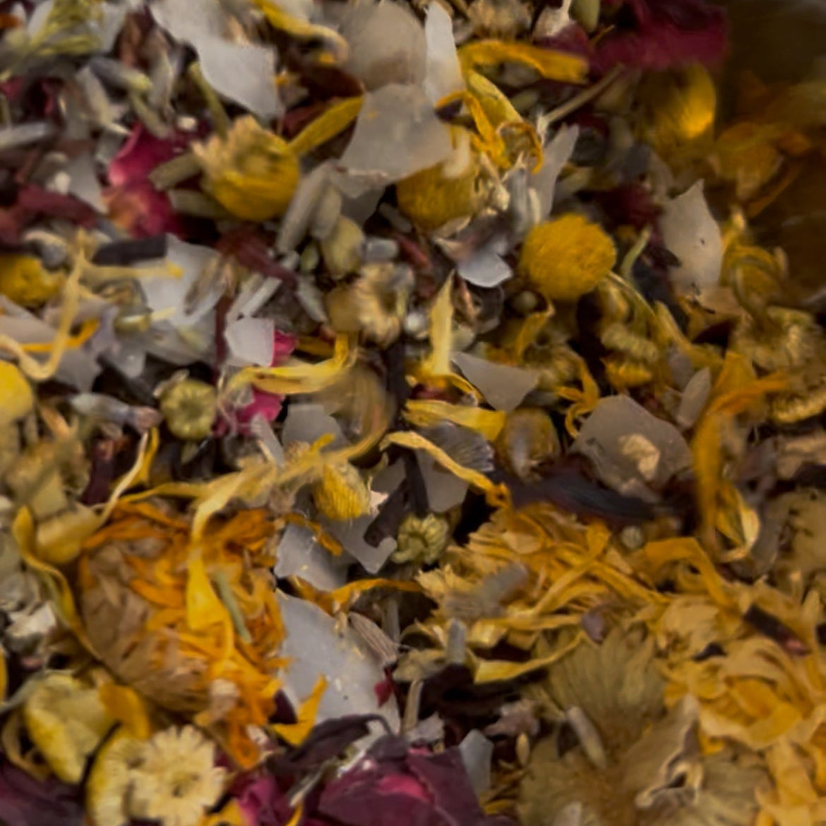 Close-up of dried flowers and herbs in a bowl