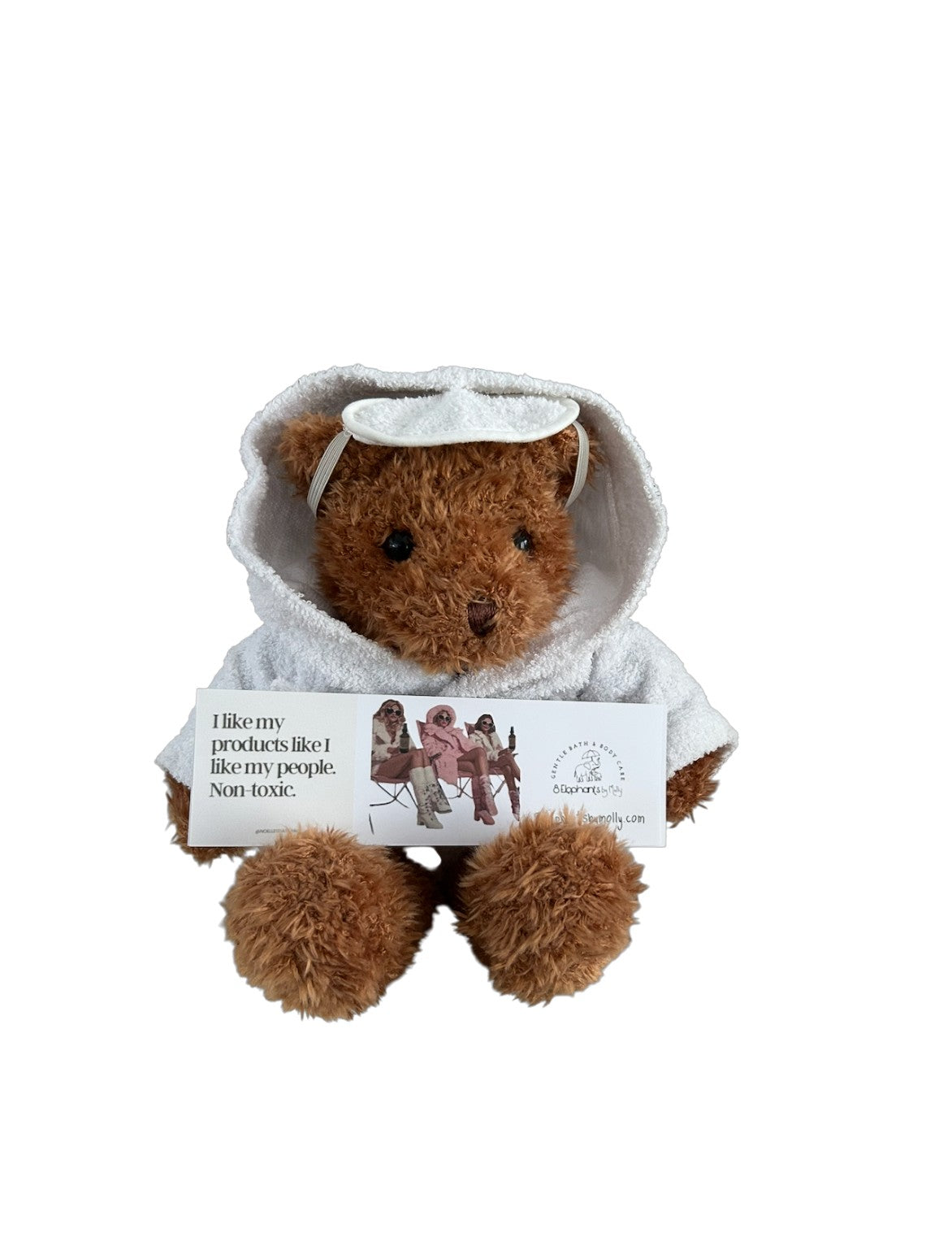 Teddy bear wearing a hoodie with a card inside on a white background