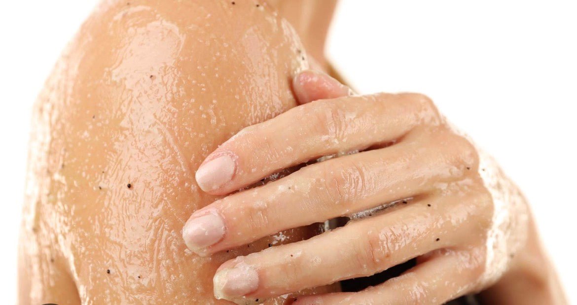 close up of a hand rubbing the salts into the neck